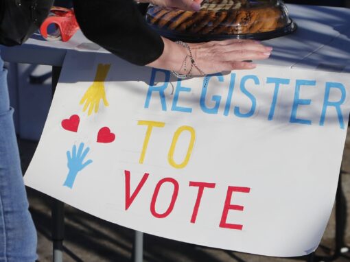 Register to vote sign